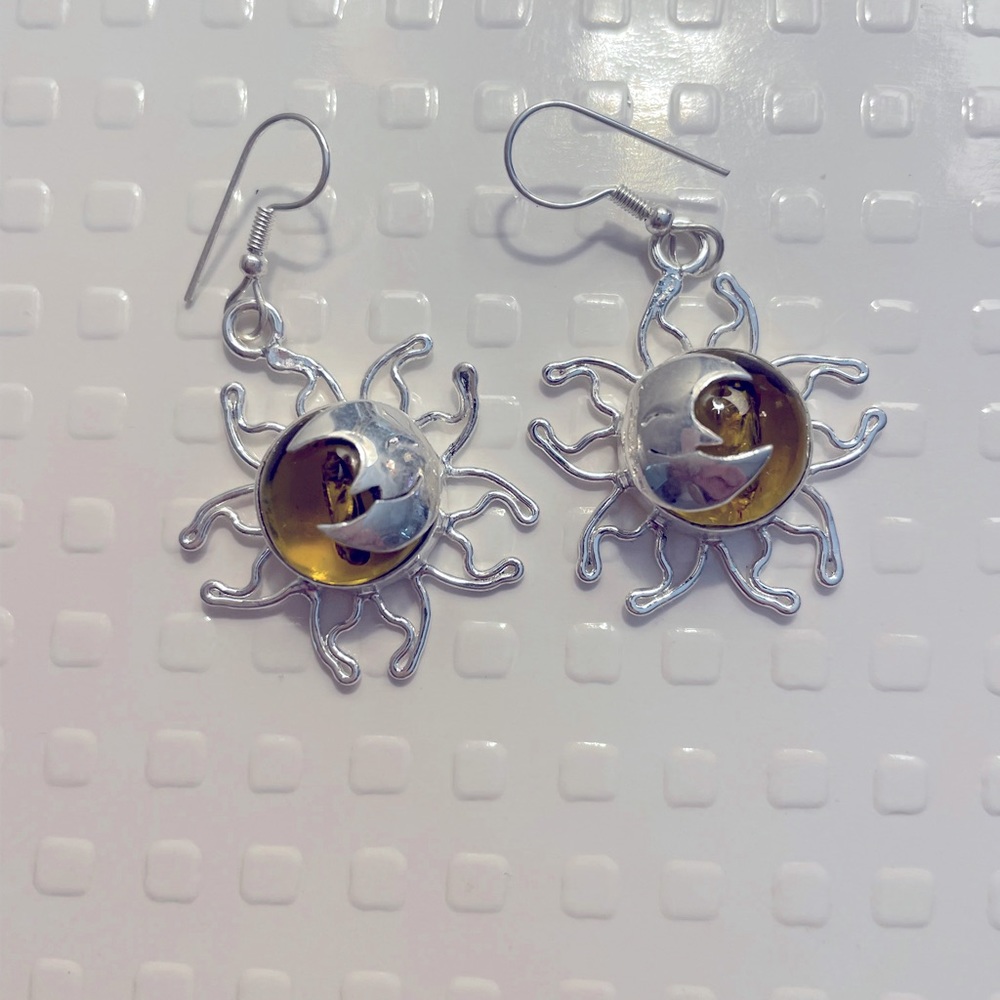 Silver earrings with Amber stone. Silver star burst and moon design. New